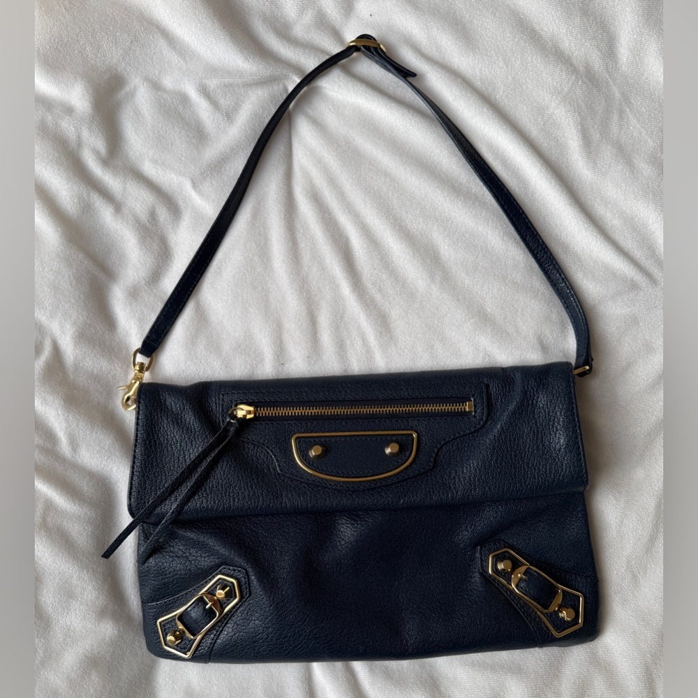 Balenciaga Black Leather Clutch with Gold Hardware in very good condition !